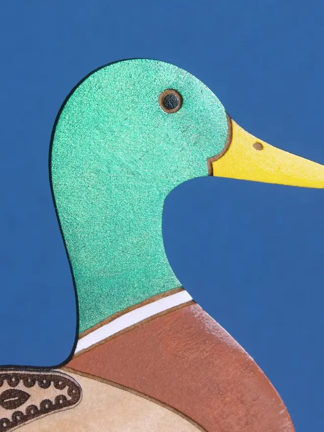 Standing Wooden Mallard Duck, wooden bird decoration standing on a platform. 