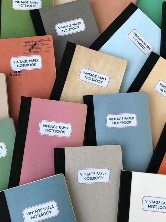 An assortment of colourful covers for the vintage paper notebooks