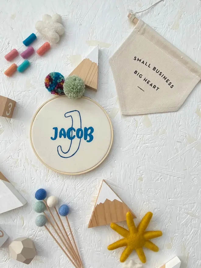 personalised name and initial embroidered hoop. cotton hoop embroidered with name jacob and letter j.