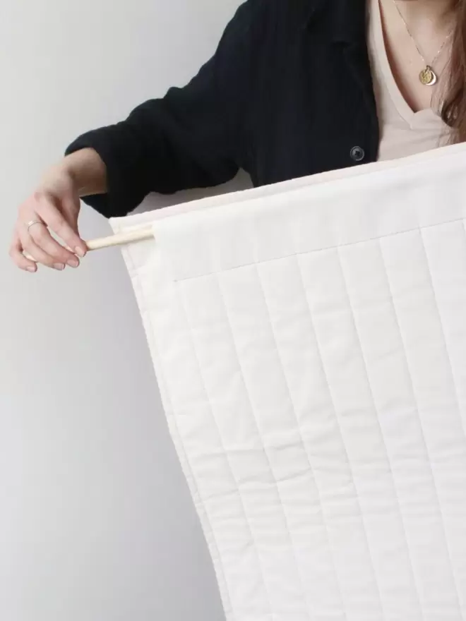 How To Hang a Quilt With a Dowel And Hanging Sleeve
