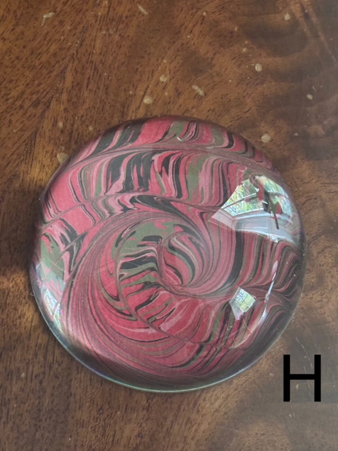 Large Paperweight. A paperweight in H.