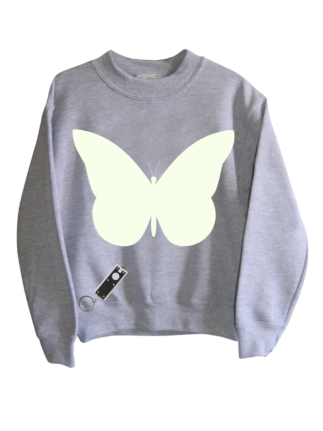 Grey sweatshirt with a glow in the dark butterfly print