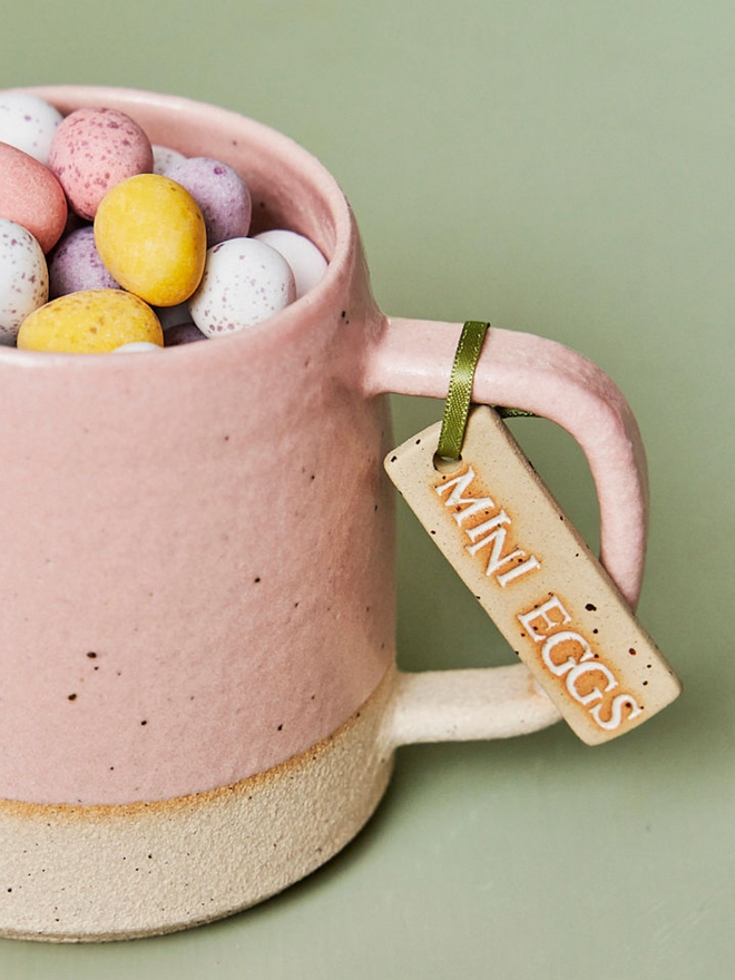 ceramic mini egg tags with white and black text