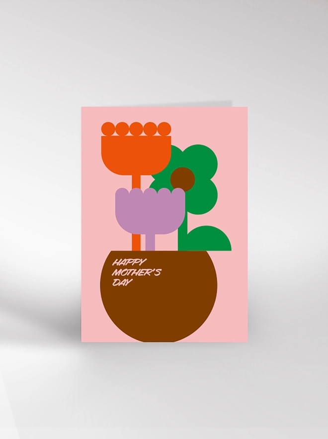 Mother's Day card with a contemporary illustration of a bowl of flowers and saying Happy Mother's Day