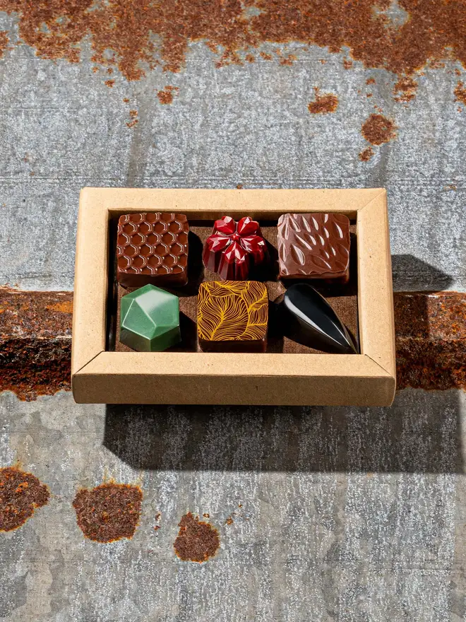 6 chocolate bonbons in a brown eco-friendly box