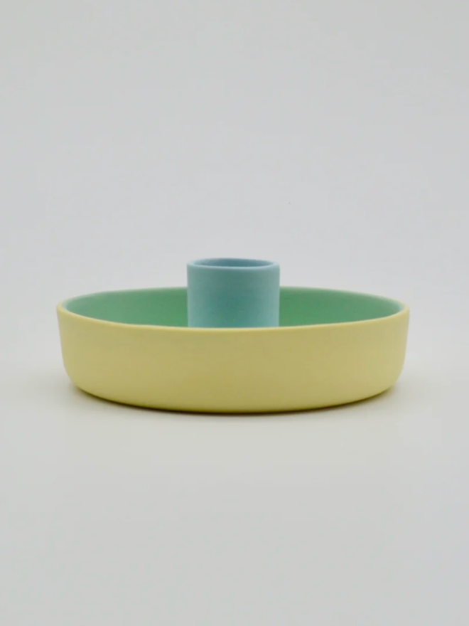 Candle Holder. A blue, yellow and green candle holder.