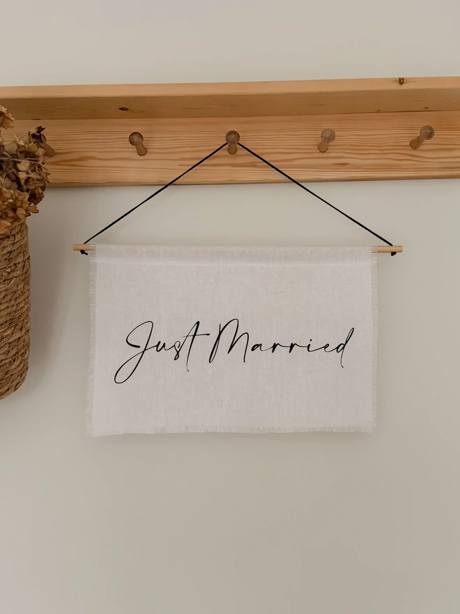 A Just Married linen hanging banner for weddings. Made from an Italian linen cotton.