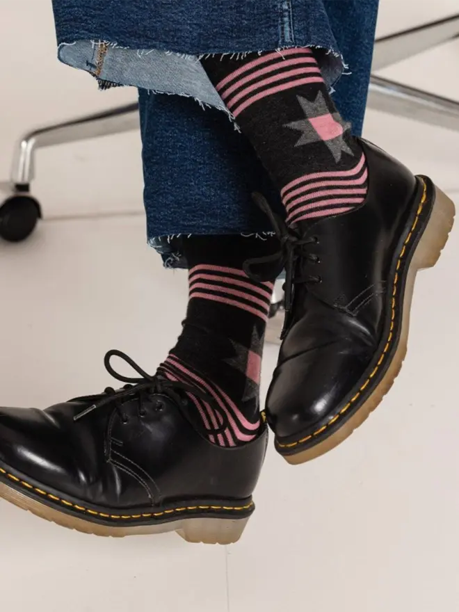 model wearing the charcoal patchwork socks