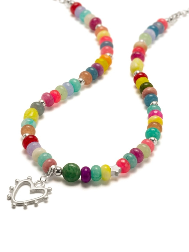 Candy girl beaded necklace. A gemstone beaded necklace with a silver studded heart charm.