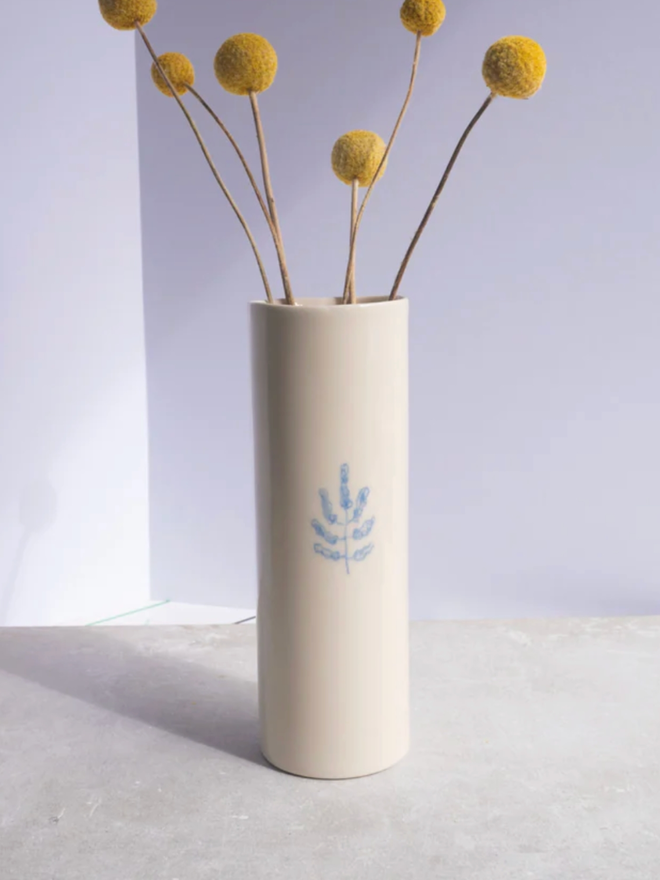 Symbol Vase. A vase with a leaf design.