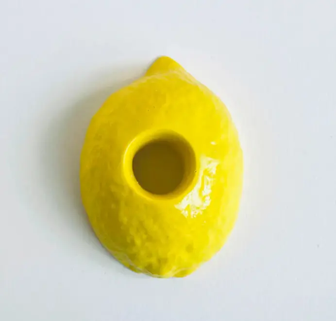 Lemon Candlestick Holder displayed against a white background. 
