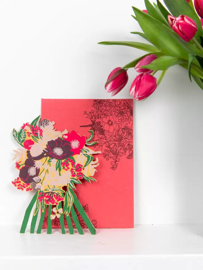 Full shot of image of bouquet flower card and envelope