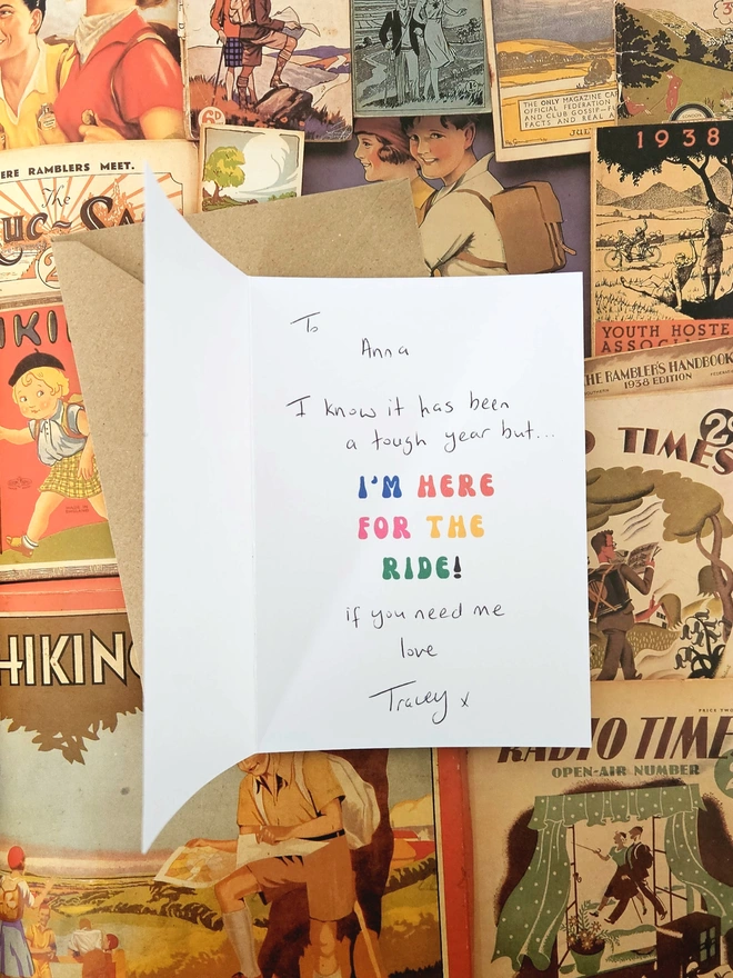 A photograph of the inside of the card and the message says I'm here for the ride. The card is written and signed to show the customer how to write it.