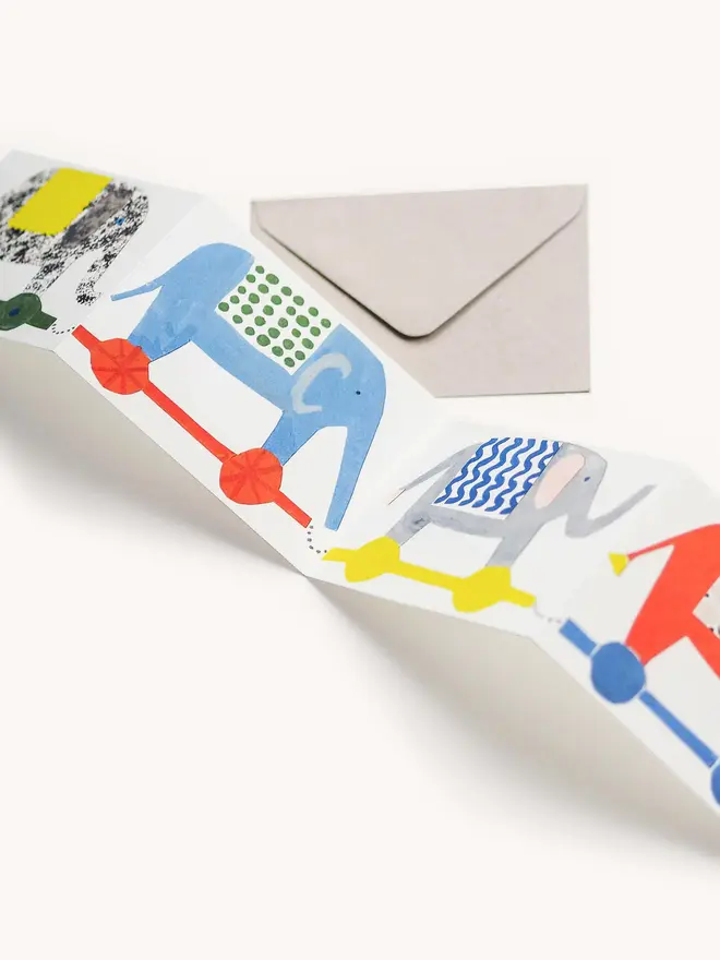 brightly coloured card with elephants