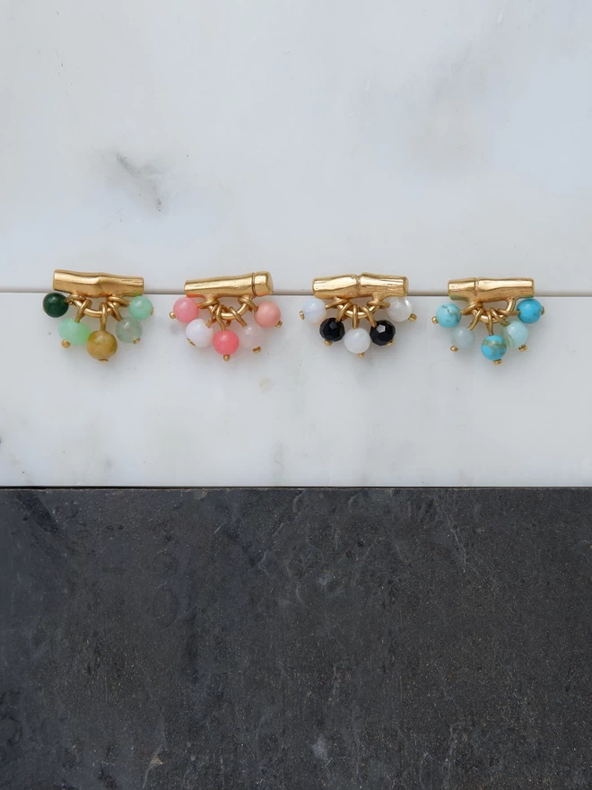 gold vermeil bamboo canes with coloured gemstone beads in greens, coral pink, black & white, turquoise blue
