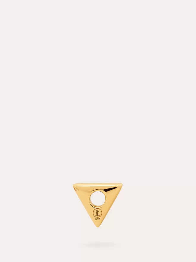 back view of a Perpetuity gold triangle Charm.