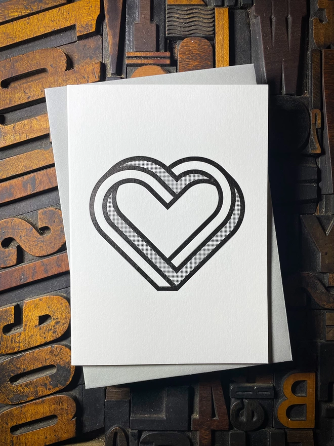 MONO INFINITY HEART LETTERPRESS CARD. Printed on my 1915 Arab Crown Folio Press. Black ink using a deep impression print. Printed on the finest Colorplan Pristine White thick double-sided card with a range of matching colours self-seal envelope.