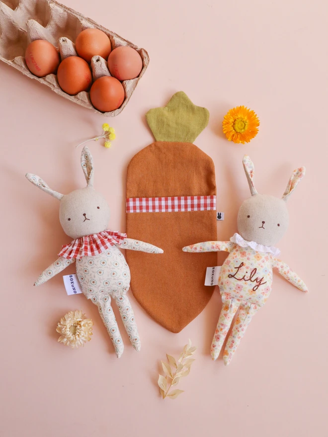natural linen rabbit dolls with printed floral outfit and ruffled white lace or gingham collar with embroidered gentle face feature. 