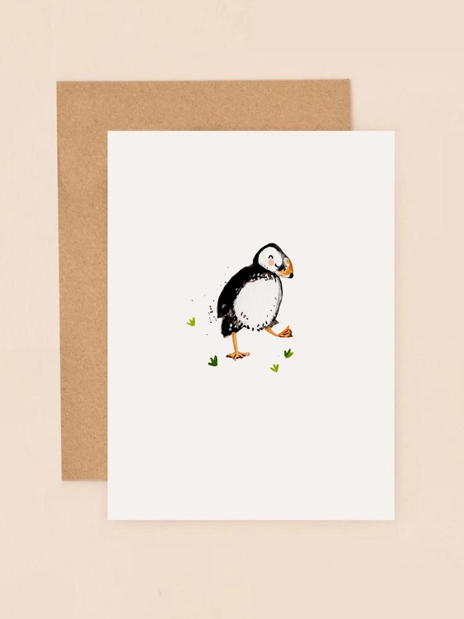 A delightful illustration of a dancing puffin with a joyful expression, exuding a sense of happiness and playfulness. The puffin's distinctive black and white plumage, orange beak, and feet are depicted with soft, flowing lines, capturing its charming character. The minimalist design features a neutral background, allowing the puffin to take center stage.