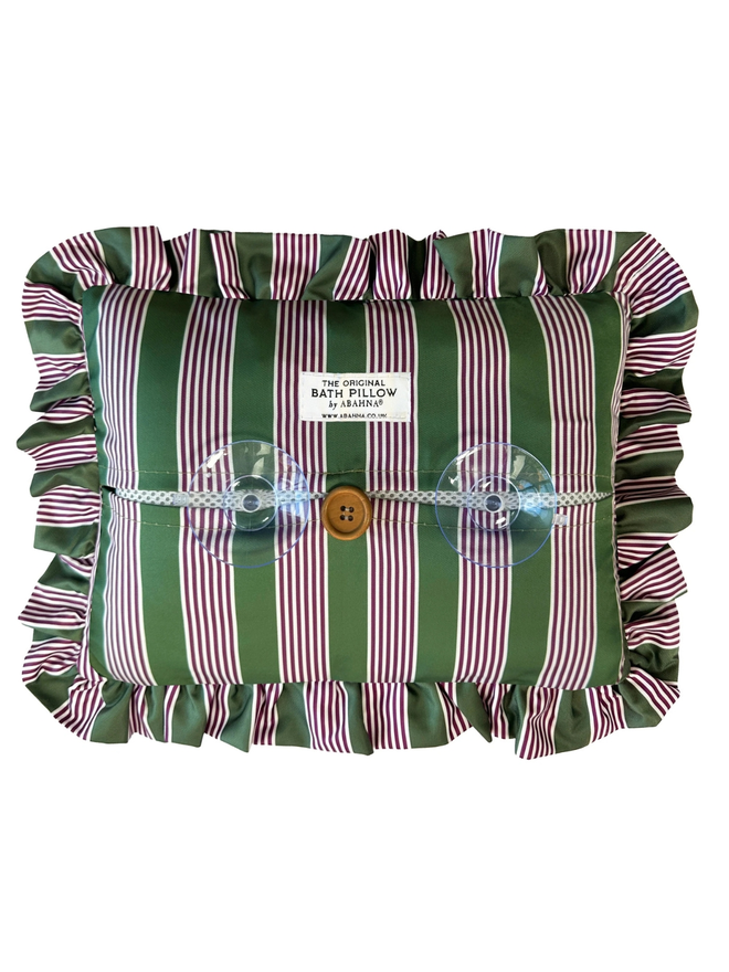 luxury frilled bath pillow. the back of a pink and green frilled bath pillow showing suction disks.