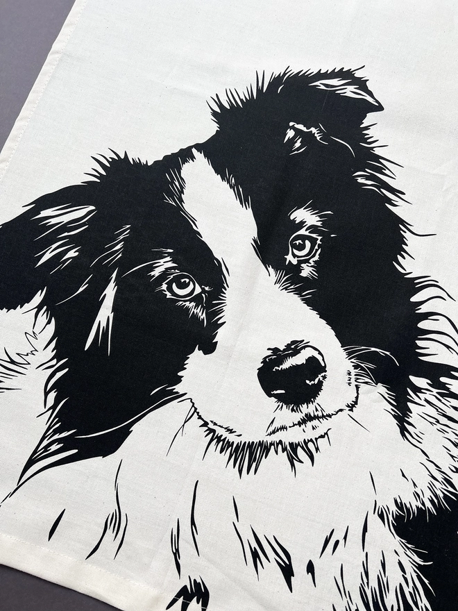 Border collie dog tea towel with the collies head printed in the bottom half
