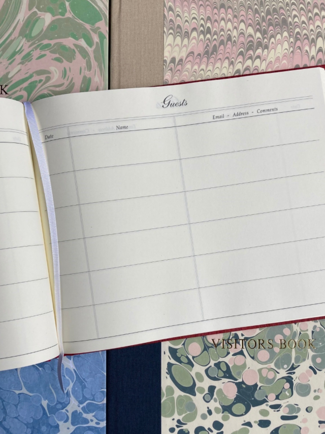 Visitor’s Book. A visitor’s book opened.