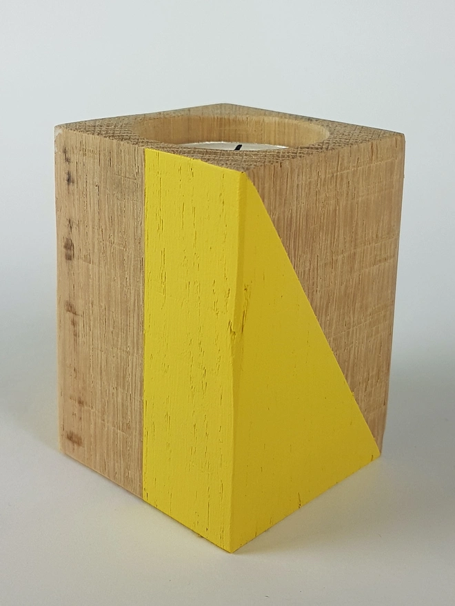 Yellow painted wooden tealight holder