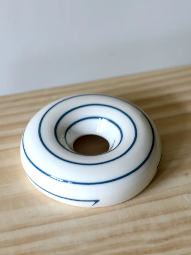 Avocado Planter White & Blue Handmade porcelain avocado planter with carved blue pattern, designed to hold an avocado seed for sprouting