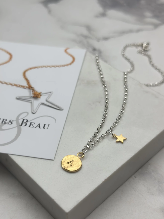sterling silver chain with personalised gold circular charm and mini gold star