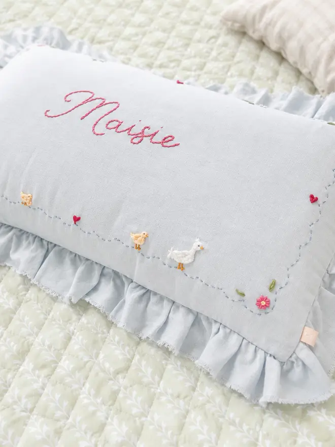 Blue linen ruffle hand embroidered keepsake heirloom cushion with ducks and flowers personalised name for new baby christening gift 