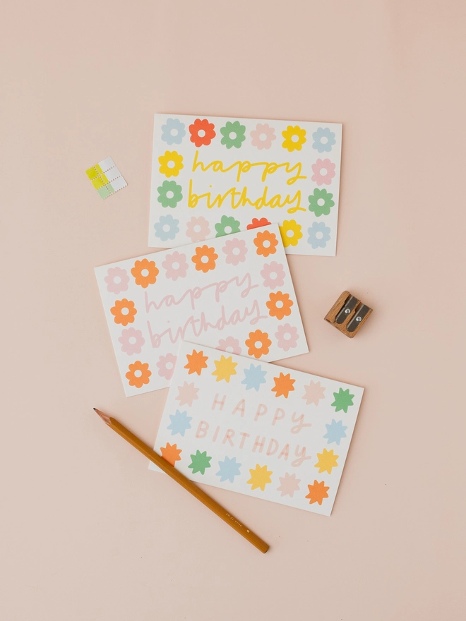 'Happy Birthday' Daisies pink and red card alongside two other cards