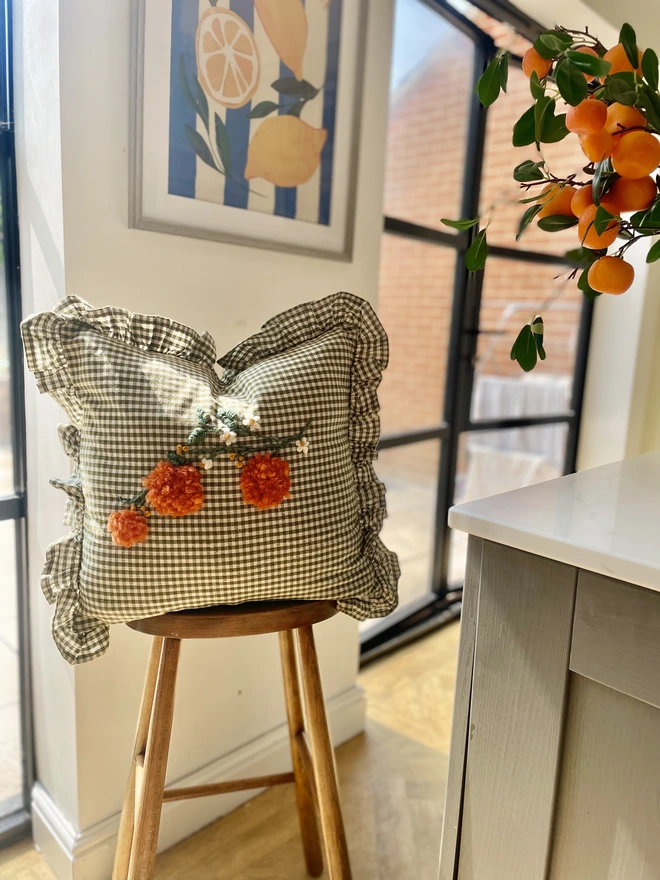 Hand embroidered bespoke orange blossom floral green gingham cushion 