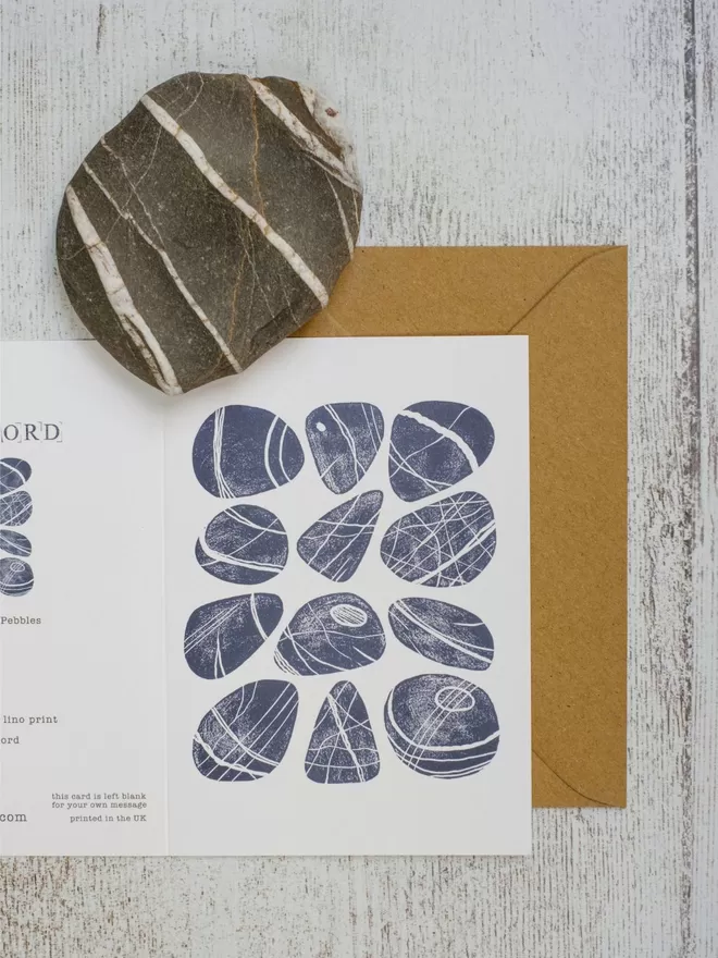 Greeting Card with an image of a Dozen Cornish Pebbles, taken from an original lino print