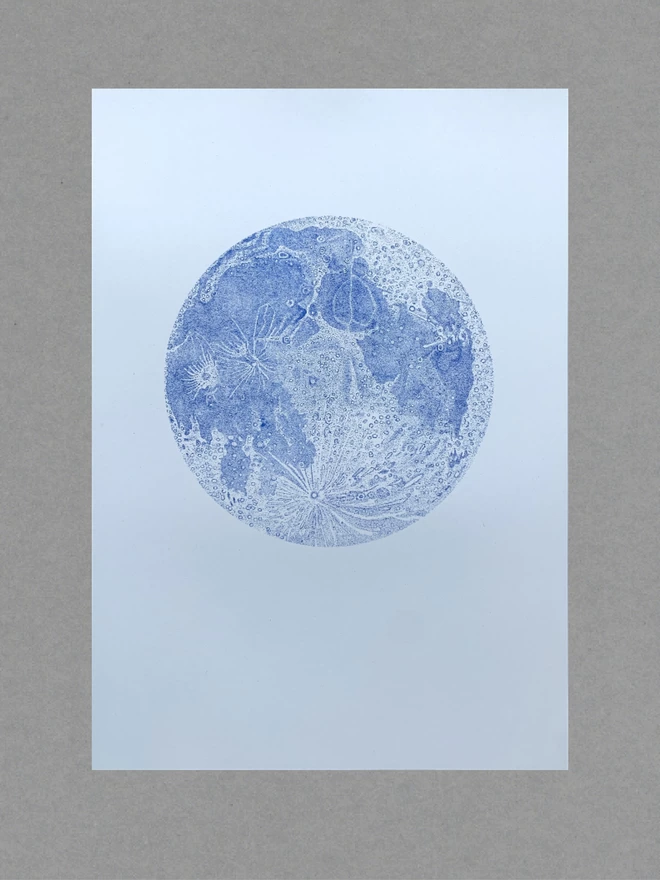 Poster of a blue moon on white paper