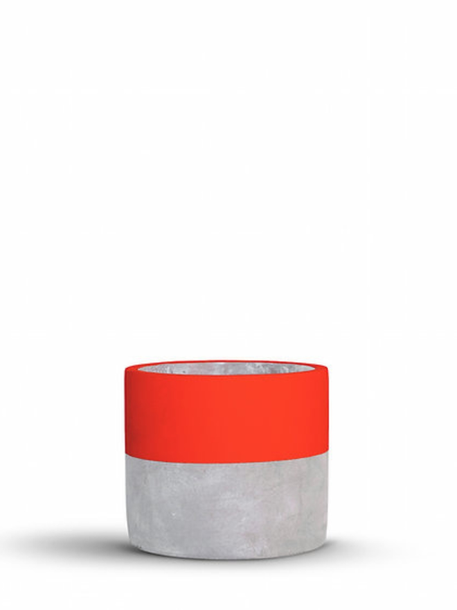 lucky dip concrete plant pot. a grey concrete plant pot with a bright red stripe around the top half.