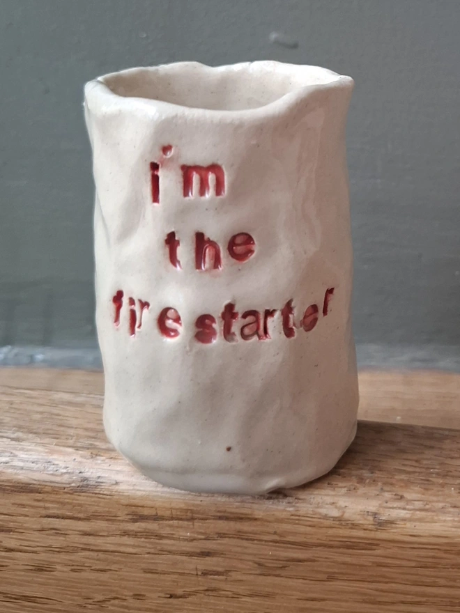 Ceramic Match Holder with the phrase 'I'm the fire starter' stamped into it 