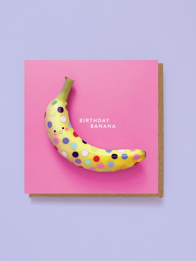A polka dot banana on a birthday card 
