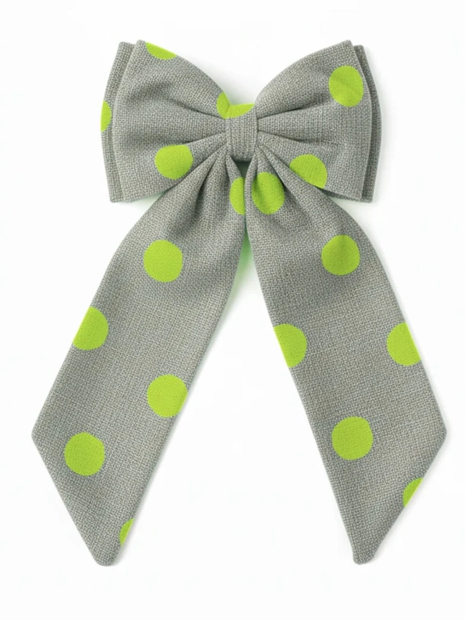 Over Sized Linen Polka Dot Bow Hanging Christmas Decoration, neon green polka dot bow placed in front of a white background. 