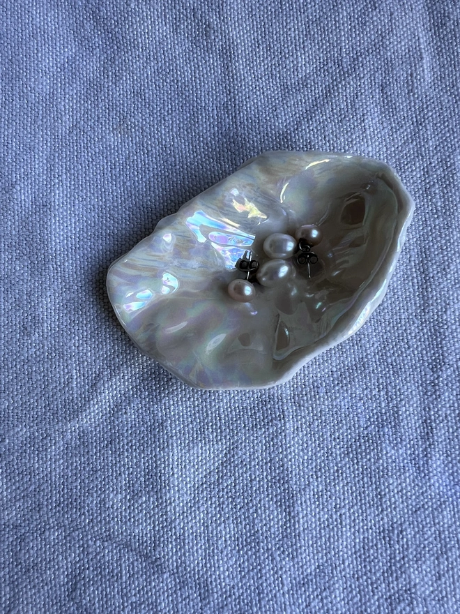 handmade porcelain oyster shell dish with pearl lustre