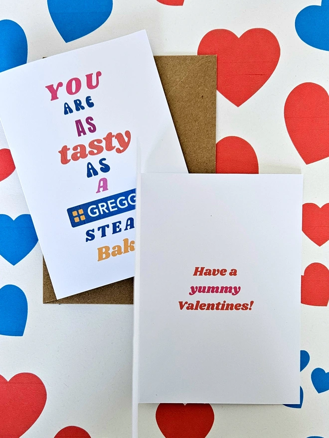 A photograph of the inside of a white card with red retro style text that says have a yummy valentines!