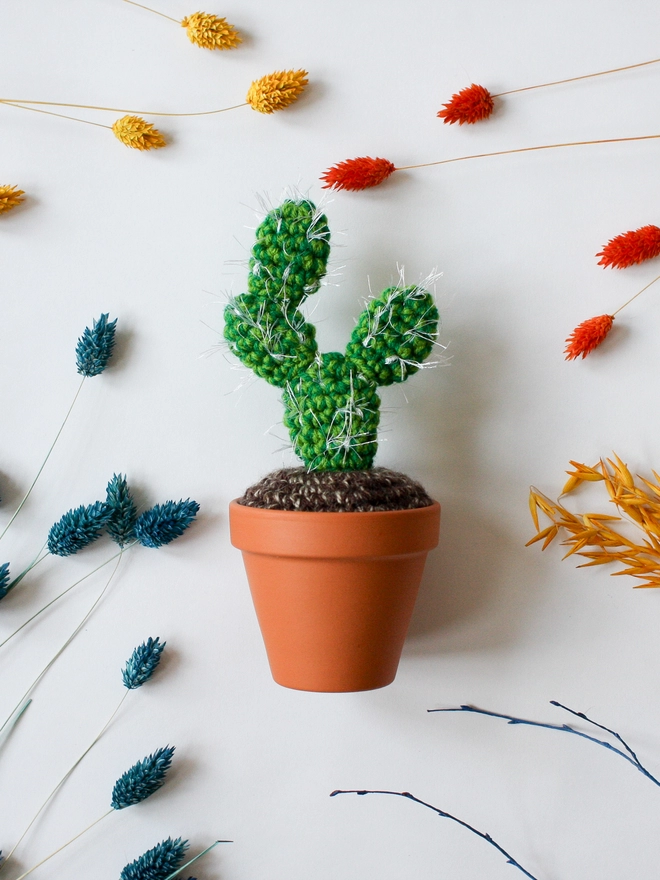 Handmade spiky crocheted cactus in terracotta pot