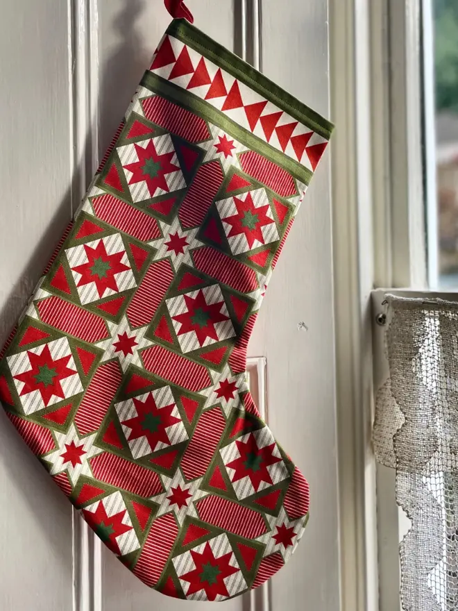 Gretel Organic Printed Stocking, hanging. 
