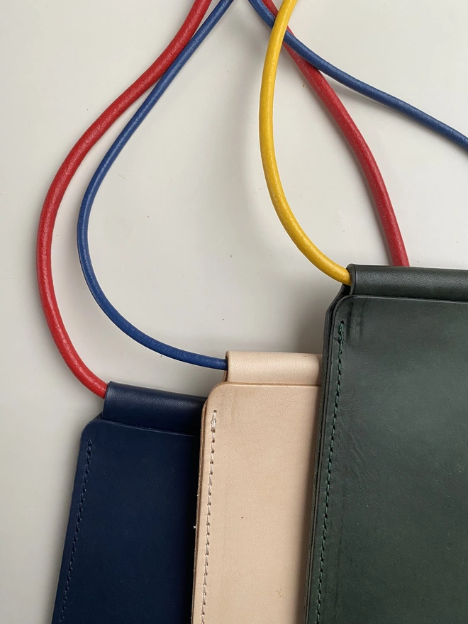 Leather phone bag with colourful strap