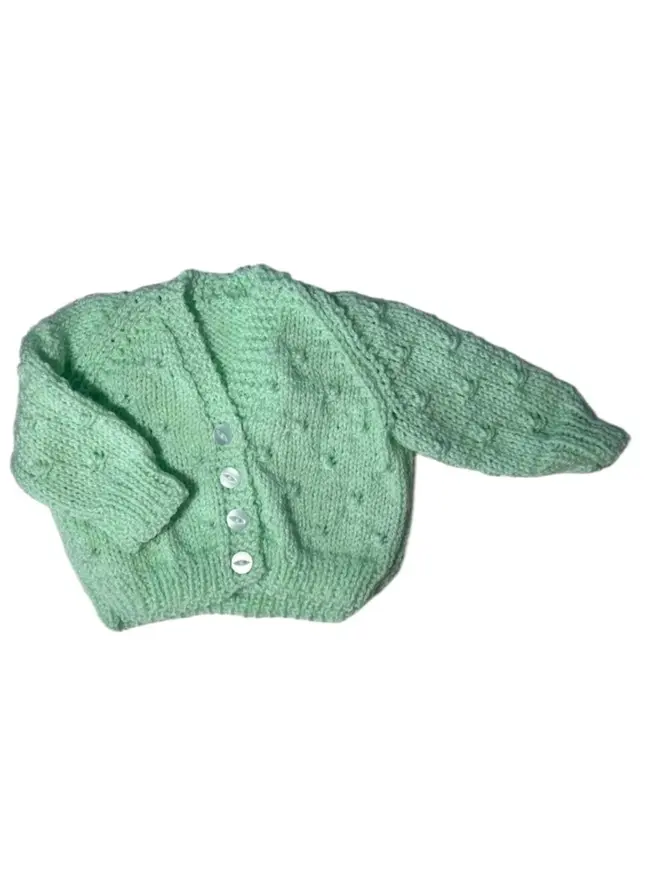 Personalised Baby Cardigans, a green personalisation on a plain surface. 