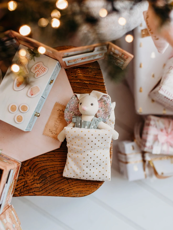 Betsy Bunny inside her woodland tree stump shop.  With her woodland animal friends and lots of prompts for imaginary play.