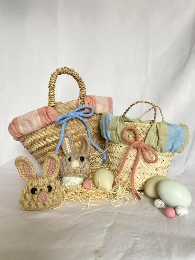hand crocheted rabbit egg cosy and striped easter baskets 