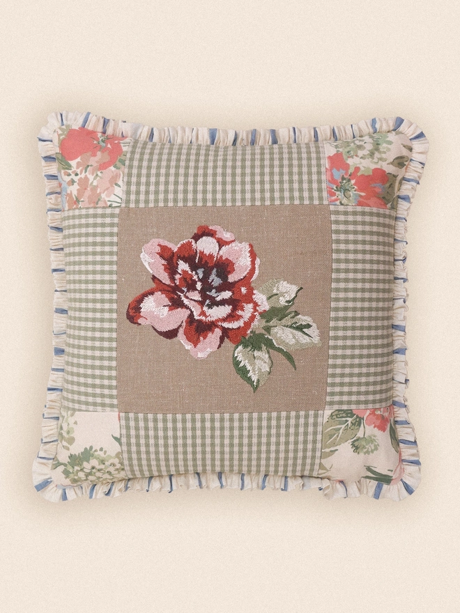 Front view of Rosa Embroidered ruffle cushion