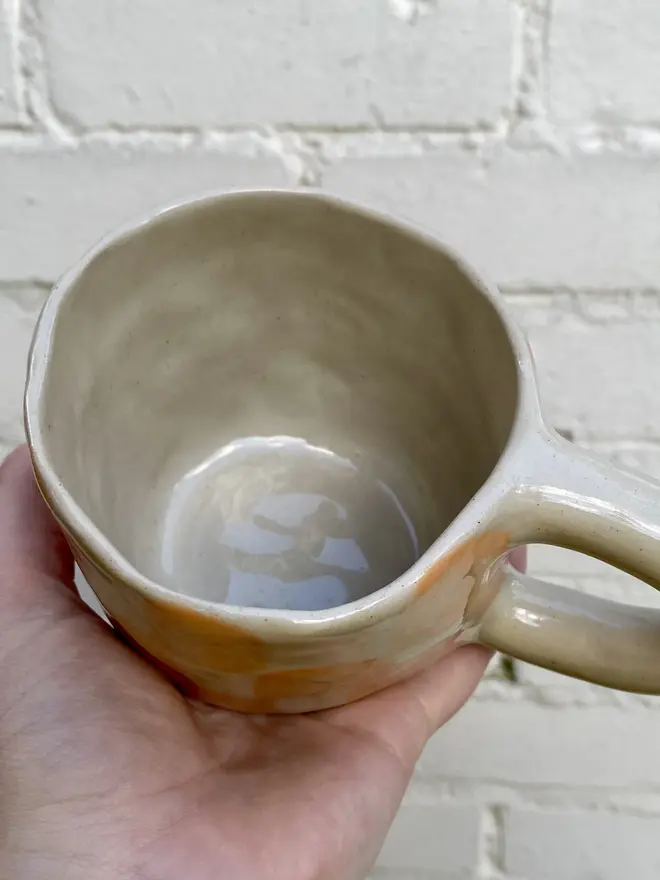 peachy checked handmade ceramic smiley face mug