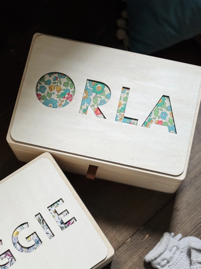 ditsy fabric peekaboo memory name box in greens and reds and blues