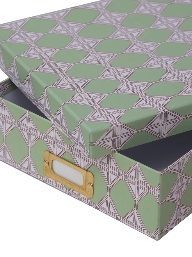 Tijan Lidded Portfolio Box, a colourful portfolio box sitting on a plain surface. 